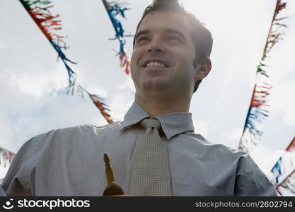 Portrait of a salesman outdoors