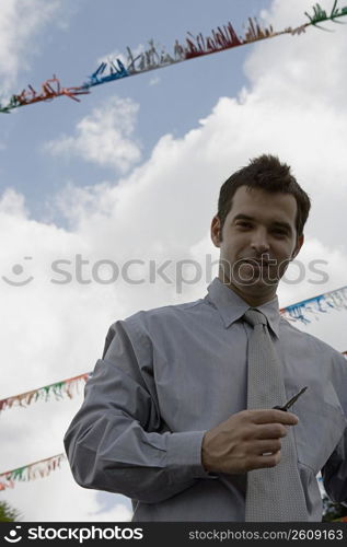 Portrait of a salesman outdoors