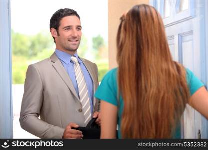 portrait of a salesman with client