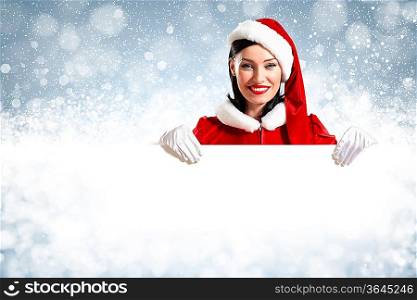 Portrait of a santa girl with a blank banner