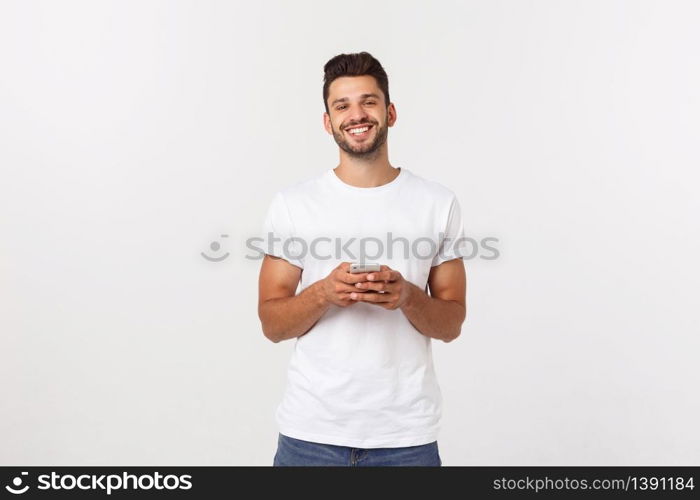 Portrait of a satisfied young businessman holding bunch of money banknotes isolated over white background. Portrait of a satisfied young businessman holding bunch of money banknotes isolated over white background.