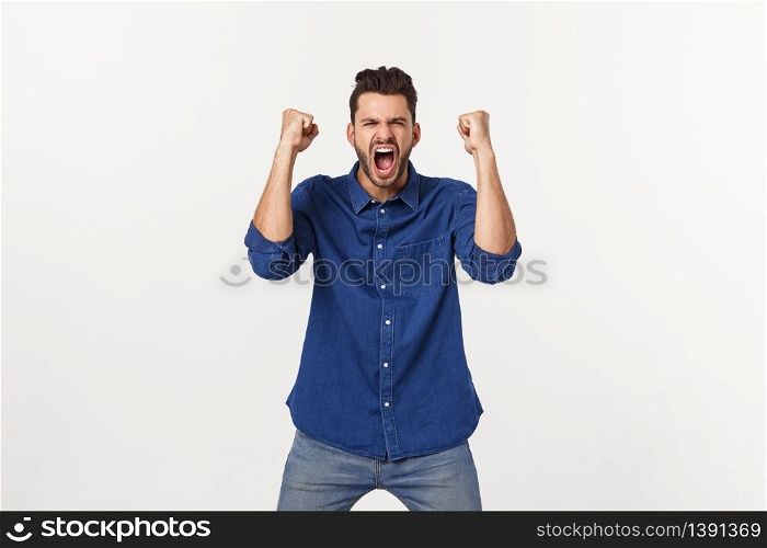 Portrait of a satisfied young caucasian man celebrating success isolated over white background. Portrait of a satisfied young caucasian man celebrating success isolated over white background.