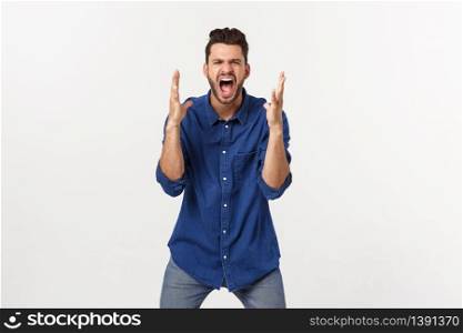 Portrait of a satisfied young caucasian man celebrating success isolated over white background. Portrait of a satisfied young caucasian man celebrating success isolated over white background.