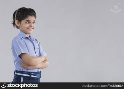 portrait of a school girl smiling at something