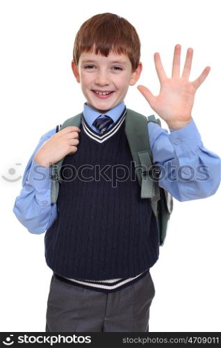 portrait of a schoolboy isolated on white background