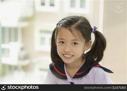 Portrait of a schoolgirl smiling
