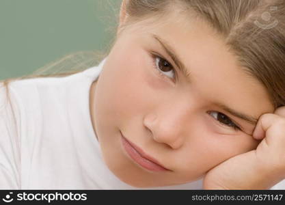 Portrait of a schoolgirl thinking