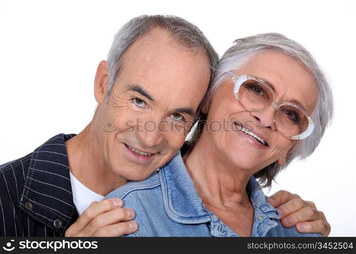 Portrait of a senior couple on white background