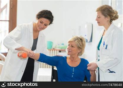 portrait of a senior doing arm therapy