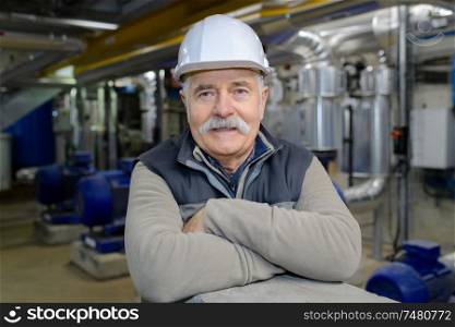 portrait of a senior maintenance worker