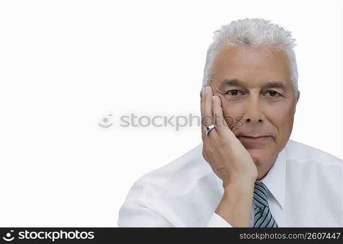 Portrait of a senior man thinking with his hand on his chin