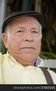 Portrait of a senior man wearing a hat