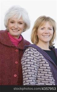 Portrait of a senior woman and a mature woman smiling