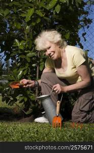 Portrait of a senior woman gardening