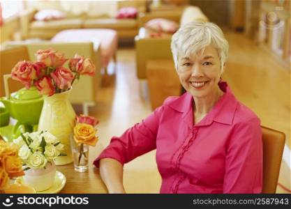 Portrait of a senior woman sitting and smiling