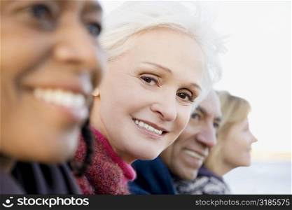 Portrait of a senior woman smiling with her friends