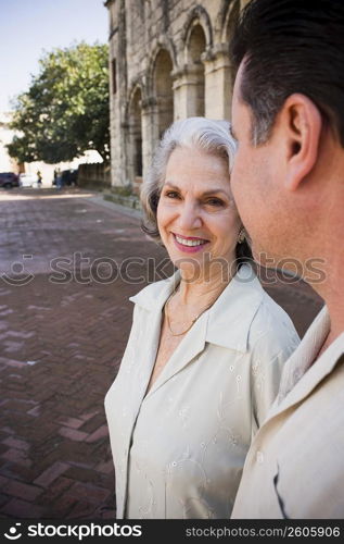Portrait of a senior woman smiling with her son, Santo Domingo, Dominican Republic
