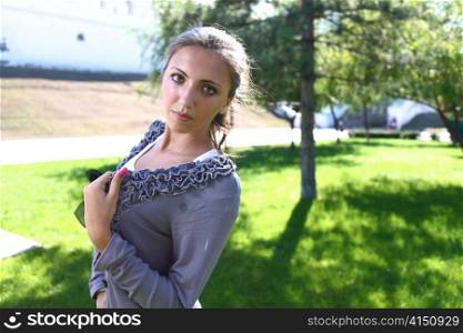 Portrait of a sexy young female in a park closeup