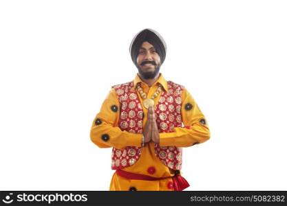 Portrait of a Sikh man greeting