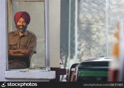 Portrait of a Sikh taxi driver at the taxi service