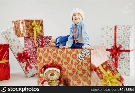 Portrait of a small boy on the large gift