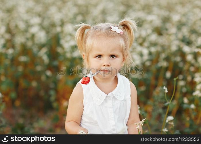 portrait of a small charismatic girl. little girl with two tails. girl with candy. little girl with two tails. portrait of a small charismatic girl. girl with candy
