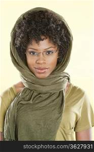 Portrait of a smart African American woman wearing glasses with stole over her head