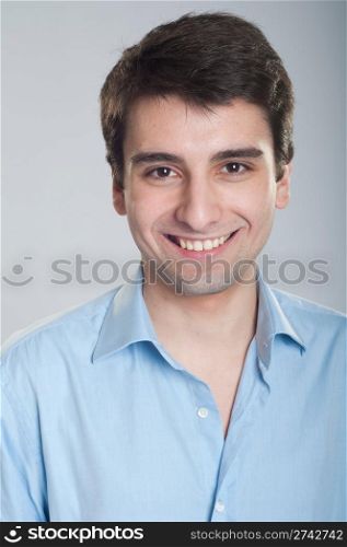 portrait of a smiling handsome trainee starting business career