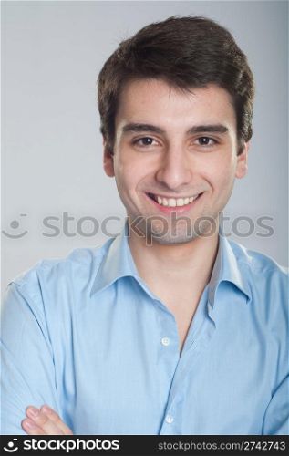 portrait of a smiling handsome trainee starting business career