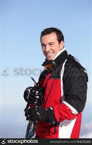 Portrait of a smiling male skier