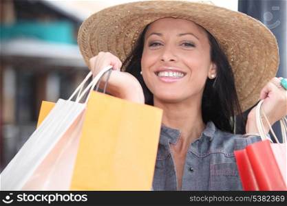 Portrait of a smiling woman doing shopping