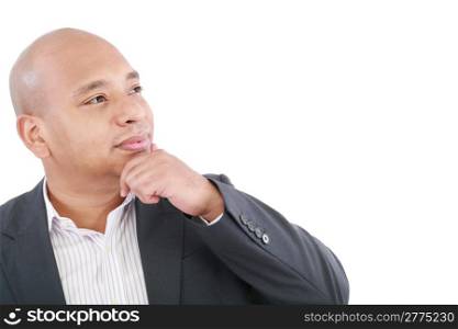 Portrait of a smiling young businessman looking at copyspace against white - Isolated