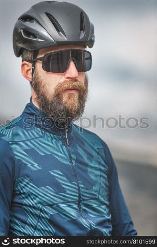 Portrait of a sportsman cyclist with helmet and goggles