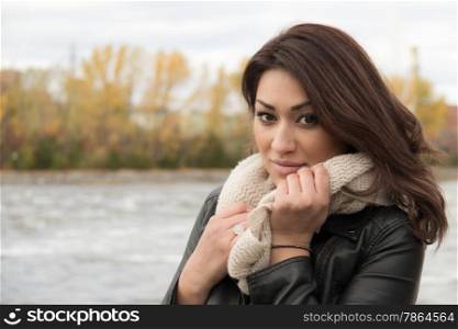 Portrait of a stylish Hispanic woman during fall