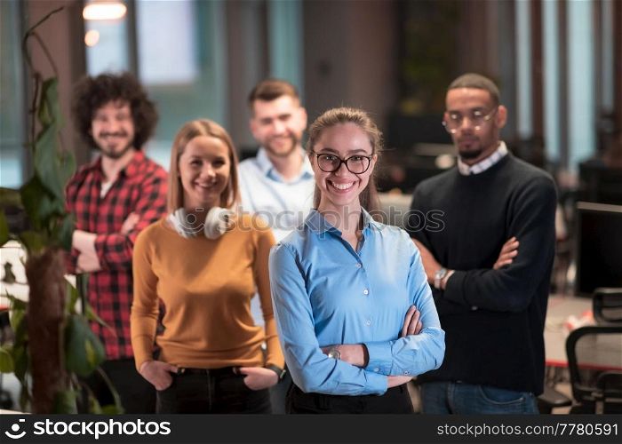 Portrait of a successful creative business team looking at camera and smiling. Diverse businesspeople standing together at startup. Selective focus. High-quality photo. Portrait of successful creative business team looking at camera and smiling. Diverse business people standing together at startup. Selective focus