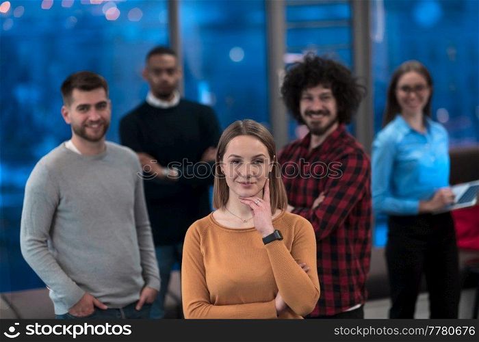Portrait of a successful creative business team looking at camera and smiling. Diverse businesspeople standing together at startup. Selective focus. High-quality photo. Portrait of successful creative business team looking at camera and smiling. Diverse business people standing together at startup. Selective focus 