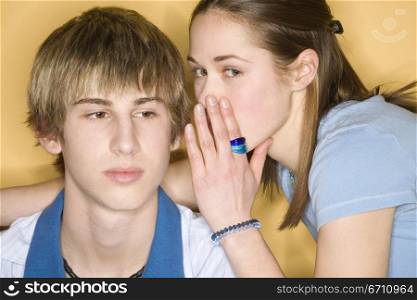 Portrait of a teenage boy and girl