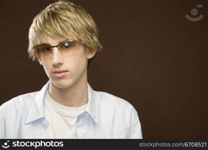 Portrait of a teenage boy wearing eyeglasses