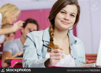 portrait of a teenage female student in class