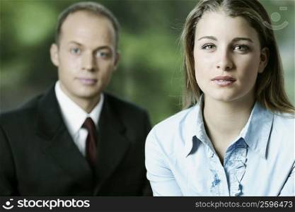 Portrait of a teenage girl and a businessman
