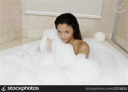 Portrait of a teenage girl in the bathtub