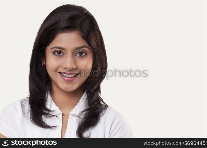 Portrait of a teenage girl over white background
