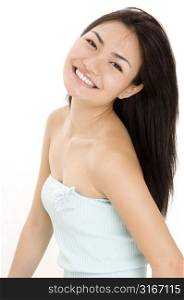 Portrait of a teenage girl smiling in a bikini