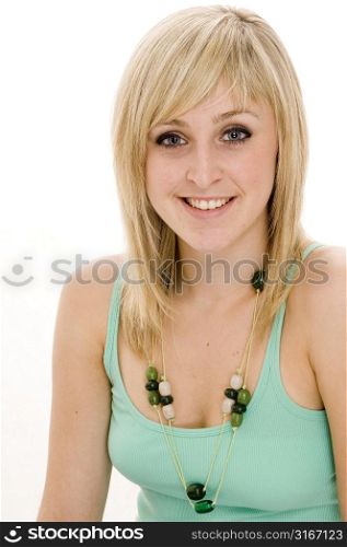 Portrait of a teenage girl smiling in a bikini