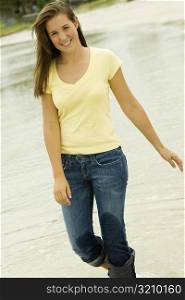 Portrait of a teenage girl walking on the beach