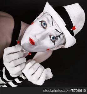 Portrait of a theater actor with mime makeup close up