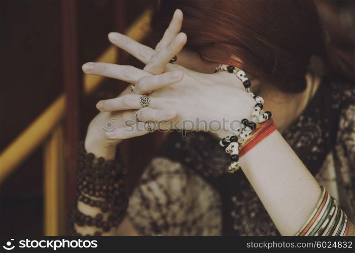 Portrait of a thoughtful young woman with closed eyes
