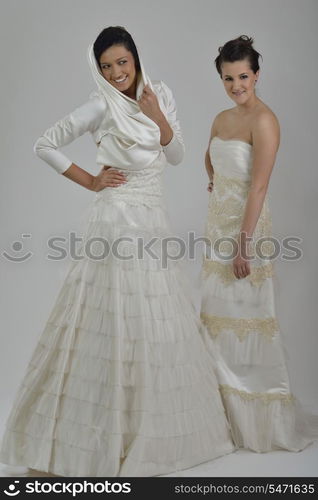 portrait of a three beautiful woman in wedding dress, bride and her friends bridesmaid