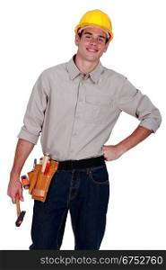 Portrait of a tradesman holding a hammer
