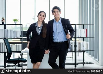 Portrait of a two businessman and businesswoman partners discussing attractive positive business expressed confidence embolden and successful concept,Working couple